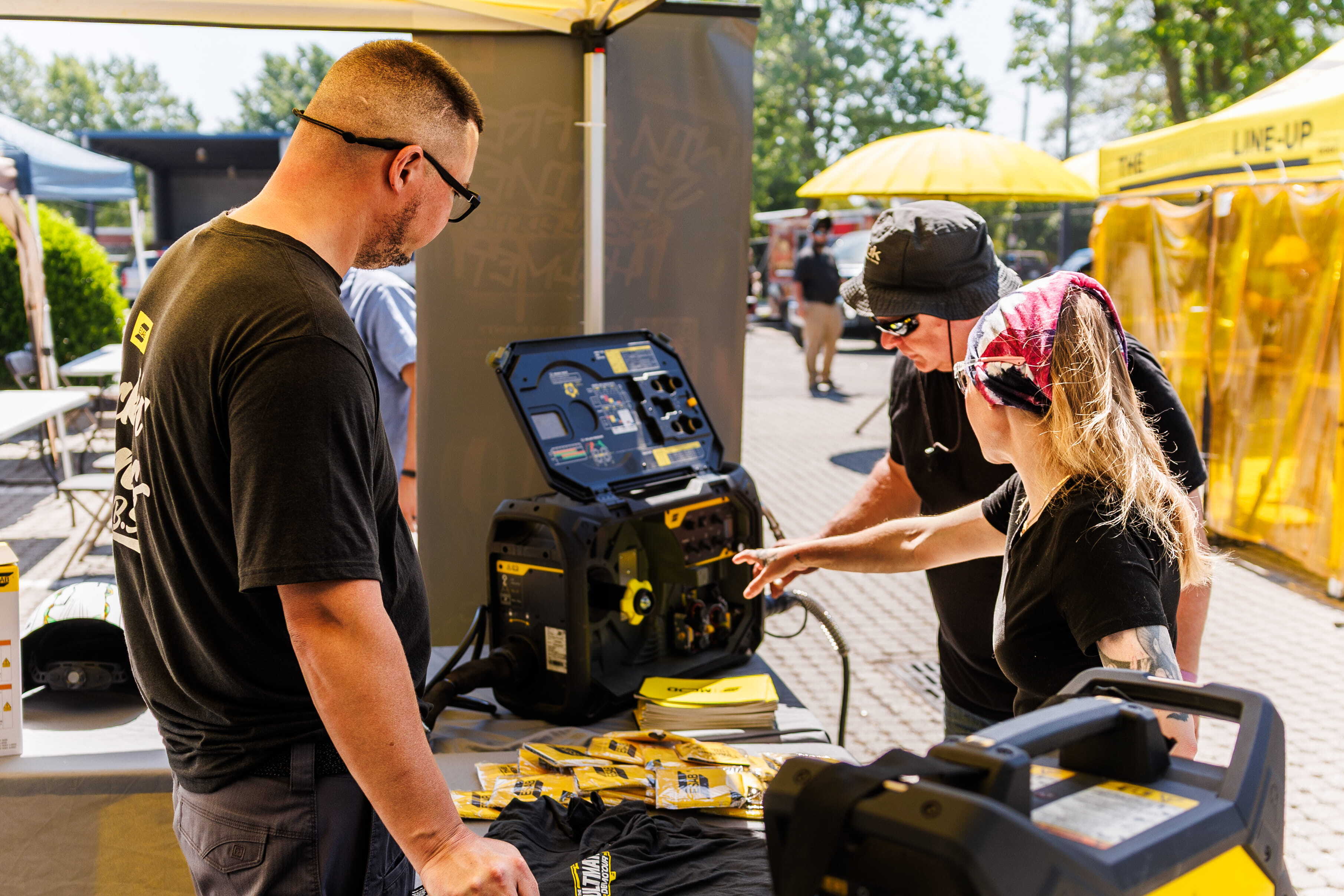 ESAB Demo Tour showcases live welding demos with welders engaging in hands-on experiences, exploring equipment features.